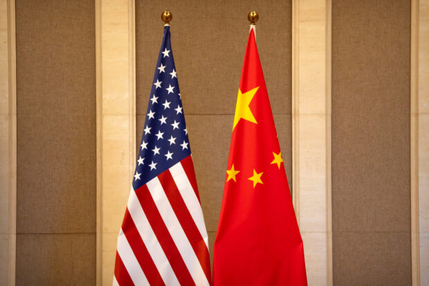 FILE PHOTO: United States and Chinese flags