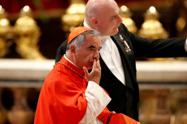 Cardinal Angelo Becciu arrives at a consistory ceremony to elevate Roman Catholic prelates to the rank of cardinal, at Saint Peter's Basilica at the Vatican, August 27, 2022. 