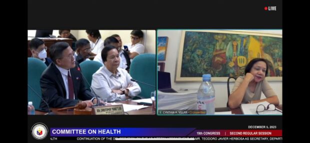 Senator Cynthia Villar (right) virtually attends Commission on Appointments hearing on Tuesday, December 5, 2023, reeling from COVID-19. Senator Bong Go (leftmost) asked her about her health during the proceeding. (Screengrabbed from Senate)