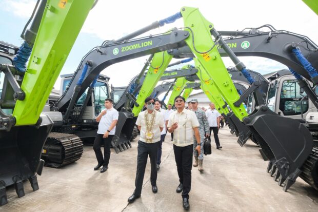 President Ferdinand “Bongbong” Marcos Jr. leads on Wednesday, Dec. 13, 2023, the turnover of P776 million worth of excavators procured by the National Irrigation Administration at Subic Freeport Zone in Olongapo City, Zambales.