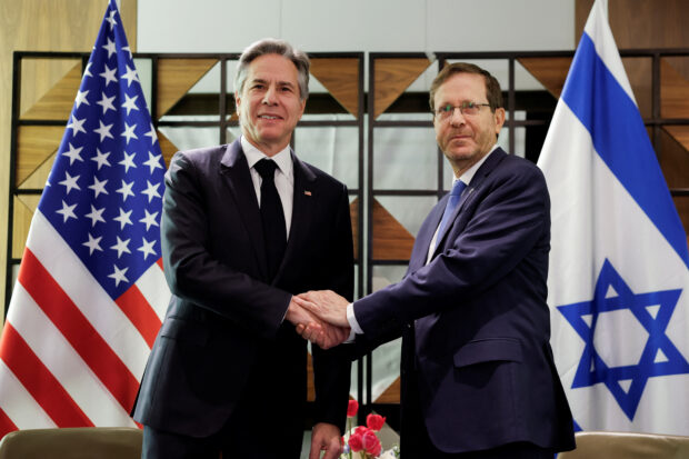 U.S. Secretary of State Antony Blinken meets Israel's President Isaac Herzog, during his week-long trip aimed at calming tensions across the Middle East, at David Kempinski Hotel, in Tel Aviv, Israel, January 9, 202