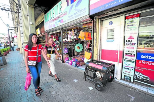 Commercial establishments in Iloilo City are forced to rely on portable generators as the power outage that began on Tuesday goes unsolved the following day.