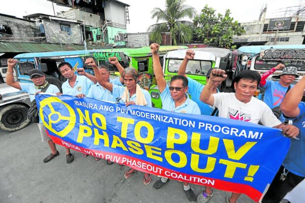 Jeepney drivers in Pasig City protest against the government’s public utility vehicle modernization program, saying it would hurt them and their livelihood.