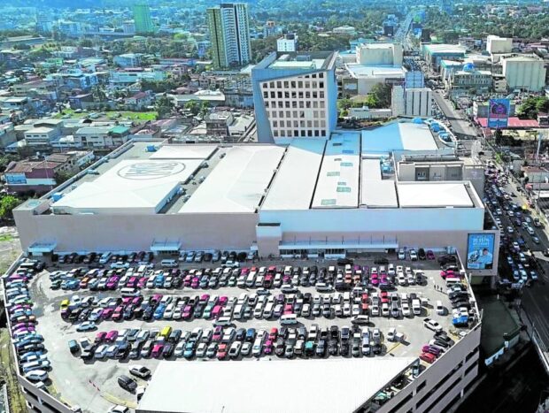 Vehicles almost fill the parking space of ashopping mall in Cagayan de Oro City during the recent holiday, indicating the return of business vibrancy in Northern Mindanao’s regional capital. 