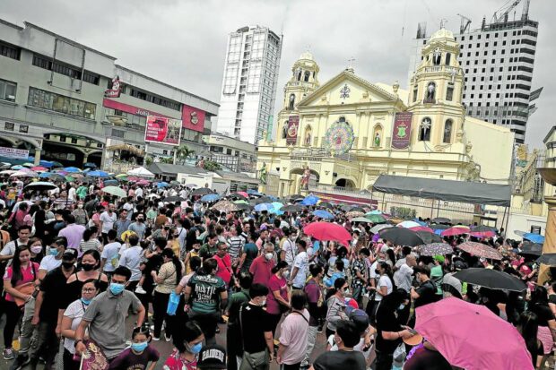THE SUNDAY BEFORE FEAST DAY The Catholic faithful flock to Quiapo Church in Manila to attend a Mass leading to Tuesday’s celebration of the Feast of the Black Nazarene. Health officials remind devotees to observe health protocols, while environmentalists appeal for a “litter-free” procession. —RICHARD A. REYES