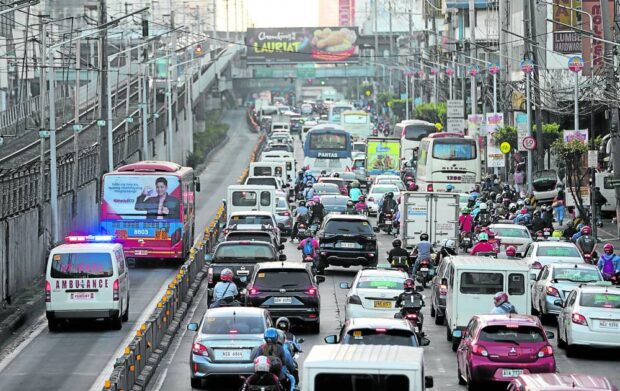 WHAT RUSH? According to the 2023 TomTom Traffic Index, motorists in Metro Manila reached an average speed of merely 19 kilometers per hour during rush hour last year. It still shows in this photo, which was taken at Edsa on Jan. 4 this year. 