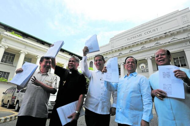 In an interesting twist, Archbishop Capalla (right) joined members of the Philippine Constitution Association in questioning before the Supreme Court the constitutionality of the Comprehensive Agreement on the Bangsamoro in 2015. 