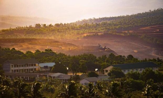 EXTRACTION SITE Mining operations are just at the doorstep of Homonhon National High School located in Barangay Casuguran on the island, which is under the jurisdiction of Guiuan town in Eastern Samar. This photo is taken on Oct. 25, 2023. —PHOTO COURTESY OF SAVE HOMONHON MOVEMENT