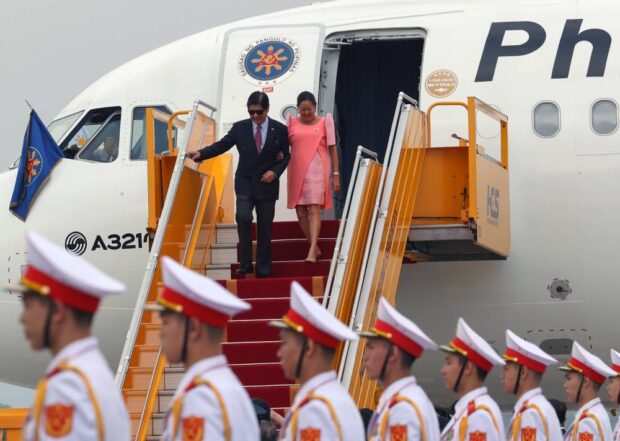 GOOD AFTERNOON, VIETNAM President Marcos and first lady Liza Araneta-Marcos arrive at Noi Bai International Airport in Hanoi, Vietnam, on Monday afternoon. The President and his delegation will meet with their Vietnamese counterparts to discuss maritime, agriculture and food security issues during his two-day state visit. MALACAÑANG PHOTO