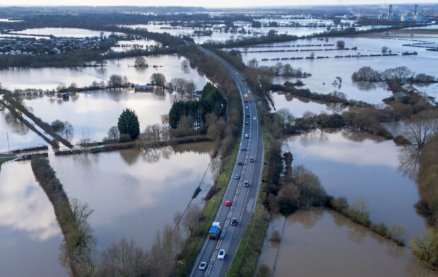 Britain hit by flooding after heavy rain swells major rivers