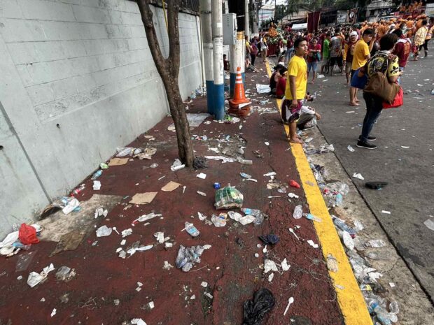 The area surrounding Plaza de Carmen is strewn with trash left by passing devotees