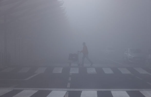 Dense fog disrupts flights, trains in India's capital