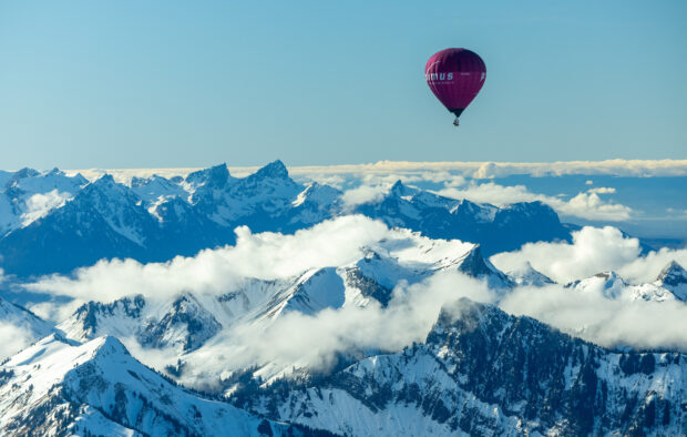 'Earth moves away' as hot air balloons fly high above Swiss Alps