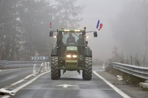 French farmers aim to put Paris 'under siege' in tractor protest