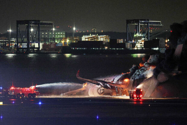 JAL passengers escape blaze after collision at Tokyo airport
