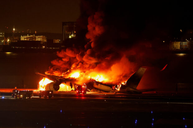 JAL plane on fire