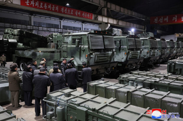 North Korean leader Kim Jong Un visits a munitions factory