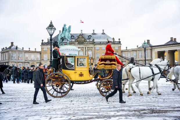 Denmark's Queen Margrethe is escorted by the Gardehusar Regiment's Horseskort 