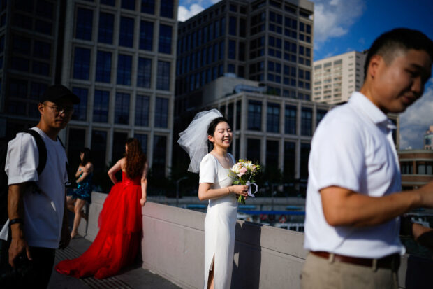 Some wealthier Chinese say they can't afford marriage as economy slows