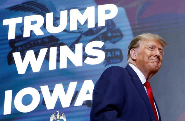 Trump cements frontrunner status to face Biden with record Iowa win