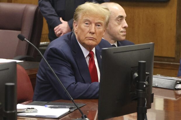 PHOTO: Donald Trump awaits the start of a hearing in New York City Criminal Court, Thursday, February 15, 2024. A New York judge says former President Donald Trump's hush-money trial will go ahead as scheduled with jury selection starting on March 25, 2024. STORY: Trump’s New York hush-money case starts March 25