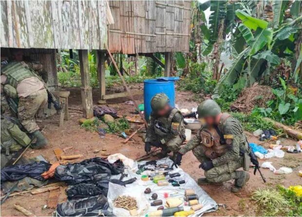 ARMSCACHE SEIZED Military troops inspect the war materiel recovered from members of the Dawlah Islamiyah-Maute terrorist group on Jan. 25 to Jan. 26 in Lanao del Sur. —AFP