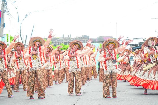 Clad in colorful costumes, dancers from sevencontingents from all over Bicol region showcase the culture and history of the first Cagsawa Church that was completed 300 years ago in Daraga, Albay, during the regional street dance competition on Friday