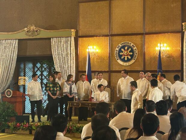 PHOTO: President Ferdinand Marcos Jr. signs the Tatak Pinoy Act and the Amendments to the Centenarian Act in Malacañang on February 26, 2024. STORY: Bongbong Marcos signs Tatak Pinoy Act