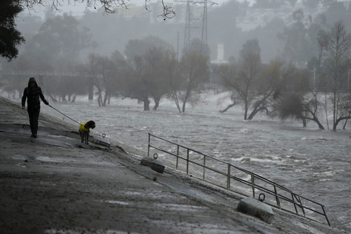 Los Angeles River threatens to overflow during torrential rains