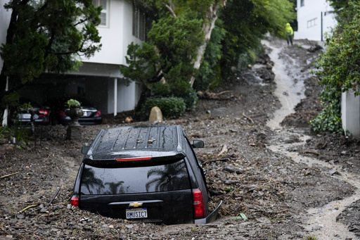 IN PHOTOS: Floods damage homes, homeless encampments in Los Angeles