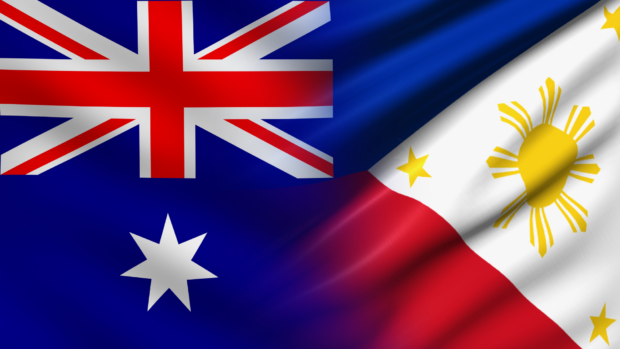 PHOTO: Composite image of Australian and Philippine flags STORY: PH-Australia agreements to push economy, national security – group