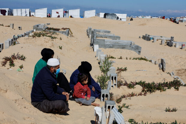 Living among the dead: Gaza families seek shelter in cemetery