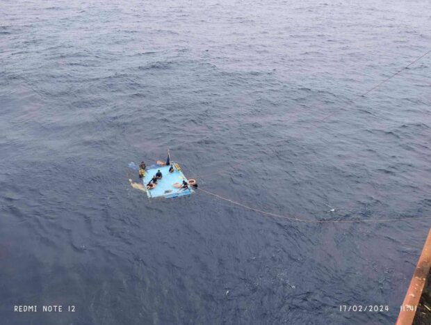 PHOTO: Six personnel of motorbanca Lorenz rescued by personnel of M/V Navios Lumen after their boat capsized off Sulu. STORY: Six rescued after boat capsizes off Sulu — Navy
