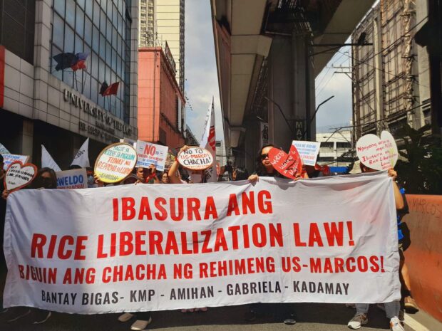 PHOTO: Members of progressive groups march along the streets of Manila to protest the Rice Liberalization Law, which they alleged is “anti-farmer.” Photo from Amihan National Federation of Peasant Women. STORY: Farmers to government: Junk Rice Liberalization Law