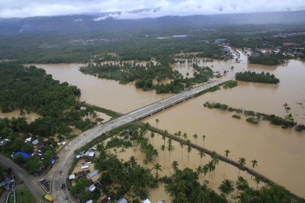 PHOTO: An aerial shot taken from a Philippine Army helicopter by a Davao de Oro Provincial Disaster Risk Reduction and Management Office personnel on Saturday, Feb. 3, 2024, shows the extent of the damage caused by floods in the town of Monkayo. STORY: Marcos releases P265 M for aid to flood-stricken Mindanao folk