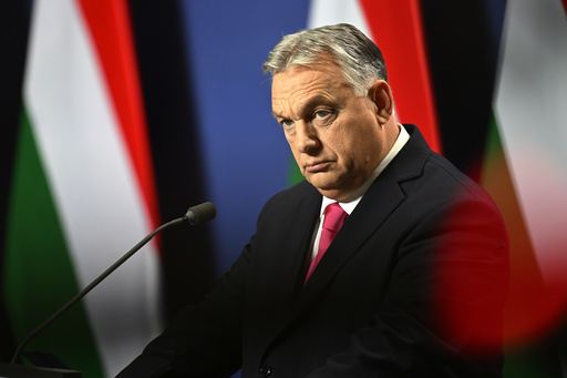 Hungary's Orbán faces rare political crisis after president resigns