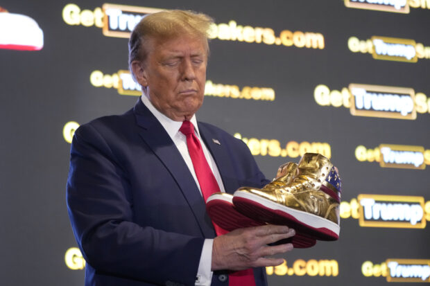 Trump hawks $399 branded shoes at 'Sneaker Con' 