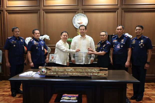 PHOTO: Ako Bicol Party-list Rep. Zaldy Co and House Speaker Ferdinand Martin Romualdez turn over a personal reward of P10 million reward to officers of the Philippine National Police (PNP) on Monday, February 26, 2024, for putting an end to the notorious Concepcion Criminal Group which has been involved in various criminal activities, including assassinations, extortion, rape, robbery, and illegal arms trade. STORY: PNP gets P10 million reward from Bicol solon for crushing crime gang