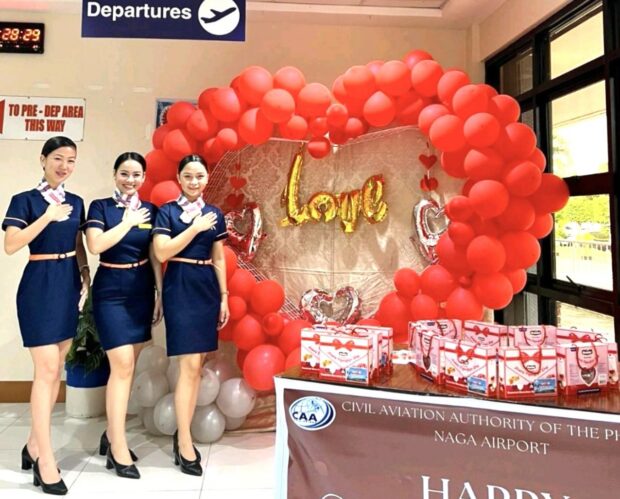 PHOTO: Love is in the air as arriving passengers from various airports across the country were greeted with flowers, chocolates, and balloons this Valentine’s Day.STORY: CAAP greets travelers with flowers, chocolates on Valentine's Day