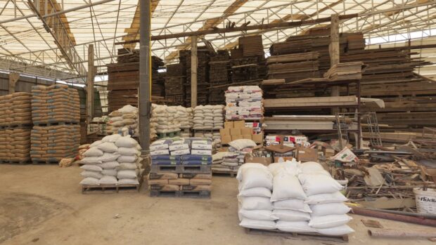 PHOTO: Interior of a warehouse with building materials STORY: Rebuilding materials eyed as prime commodities