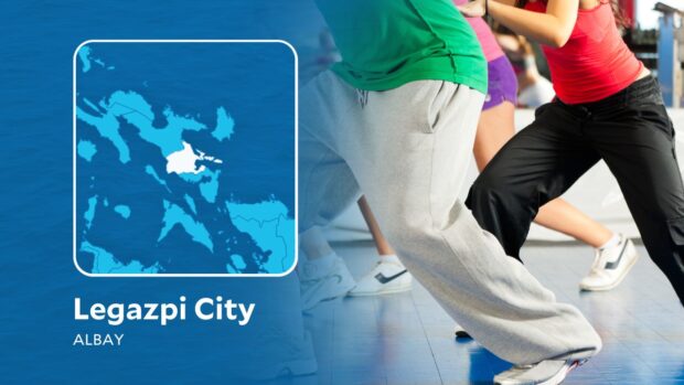 PHOTO: Composite image Philippine map showing location of Legazpi City blended with people doing zumba STORY: Legazpi police do zumba during anti-Cha-cha rally