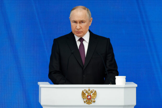 Russian President Vladimir Putin delivers his annual address to the Federal Assembly, in Moscow, Russia.