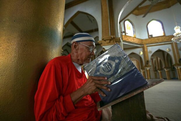 A faithful read the Holy Quran at the Golden Mosque in Quiapo, Manila a day before the beginning of the Muslim holy month of Ramadan. STORY: Marcos urges forgiveness, harmony in Ramadan message