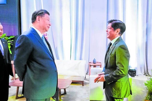 ‘NOT POKING THE BEAR’ That’s how President Marcos, seen here with Chinese President Xi Jinping during the Asia-Pacific Economic Cooperation Leaders’ Meeting in November 2023, describes Manila’s approach to avoiding military conflict with the Asian giant over the West Philippine Sea issue. —Malacañang photo