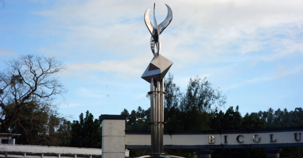 PHOTO: Bicol University’s torch sculpture symbolizes the institution’s guiding hand in the students’ learning journey. STORY: Bicol University tweaks entry rule for poor students