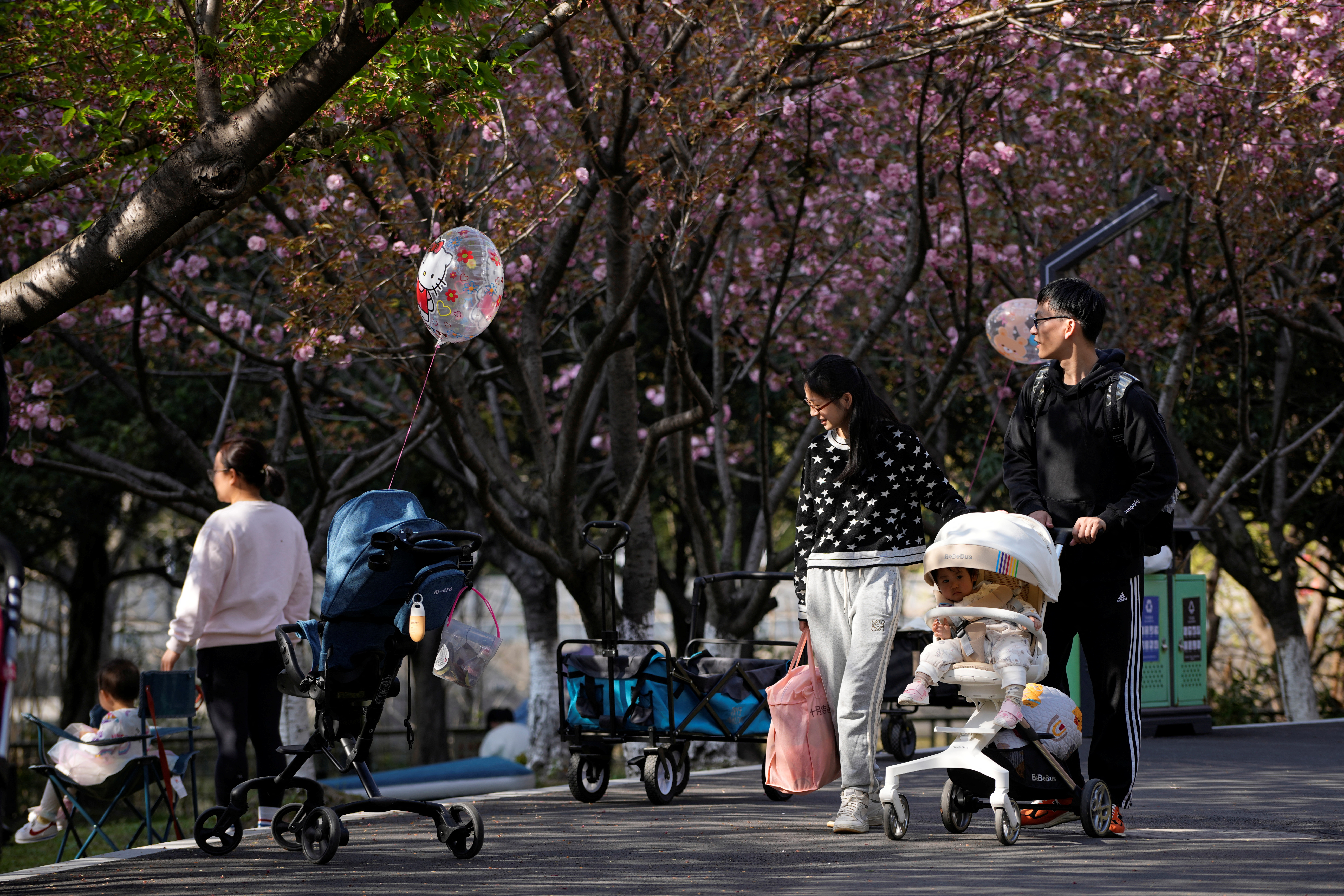 China to improve childbirth policies, boost support for elderly