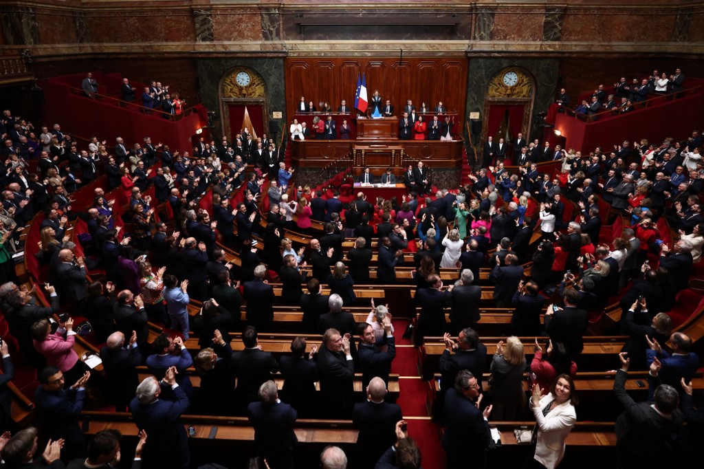 Mps and senators applaud after the French parliament voted to anchor the right to abortion in the country's constitution, 
