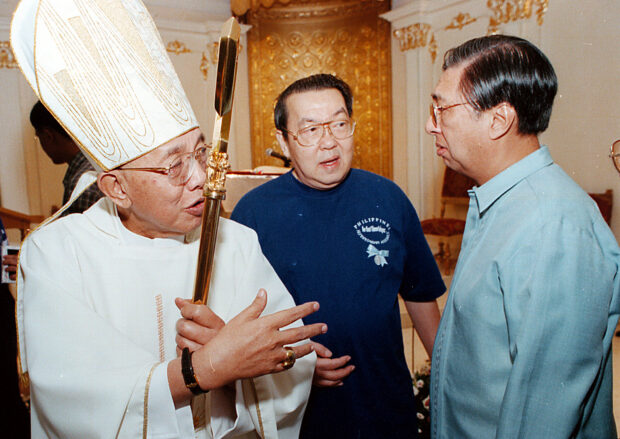 Concepcion in an exchange with Cardinal Jaime Sin and Foreign Secretary Domingo Siazon