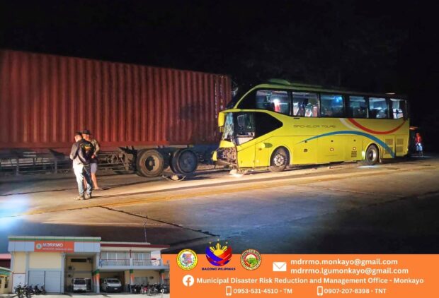 In this photo taken on Sunday, March 24, 2024, the Bachelor Express bus rammed the rear end of a trailer truck along the national road in Monkayo town, Davao de Oro, killing the bus conductor and injuring 22 passengers. 