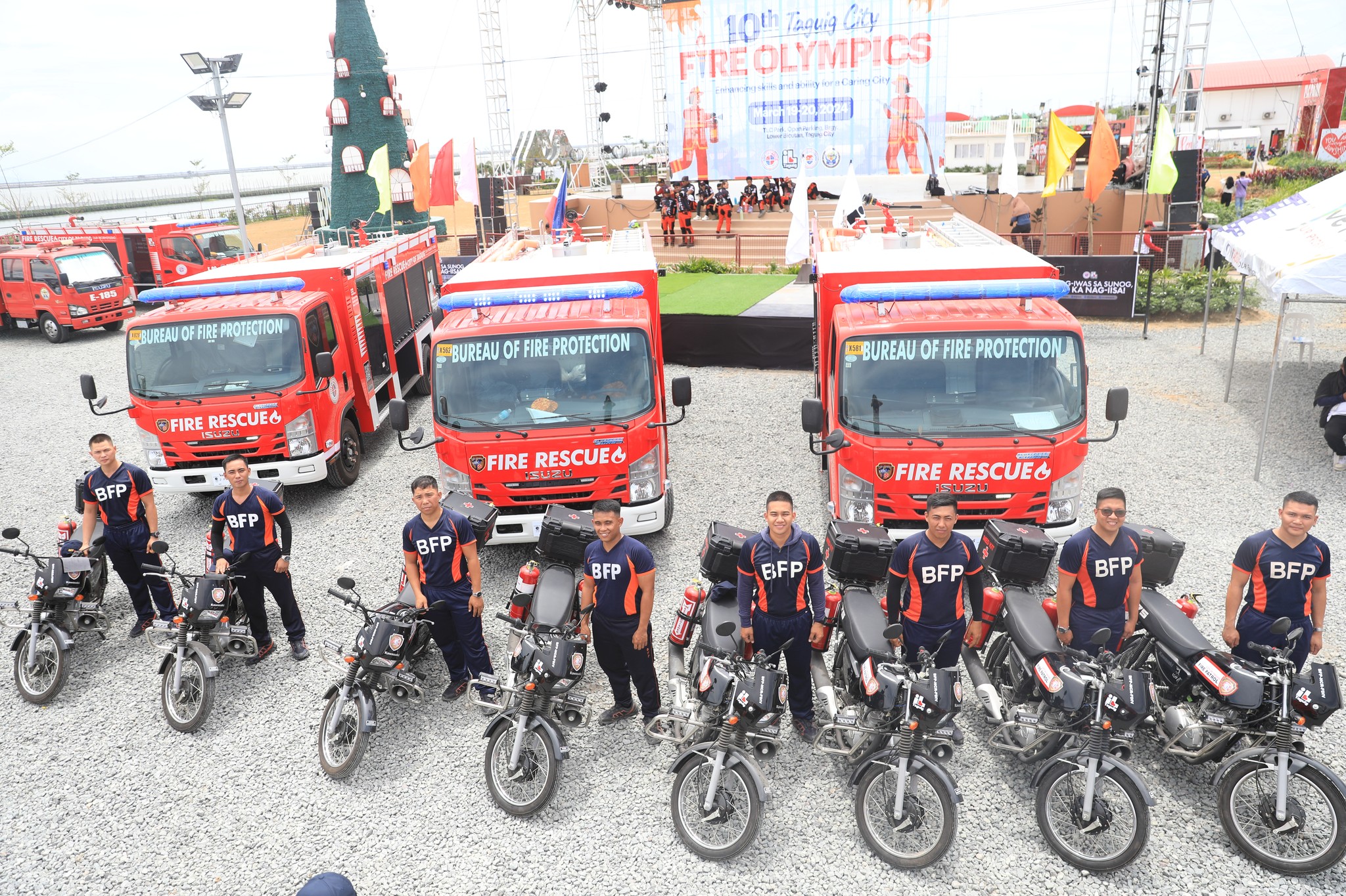 The Bureau of Fire Protection-Taguig receives three fire trucks and eight motorcycles from the Taguig local government on Tuesday as part of its Fire Prevention Month campaign. 
